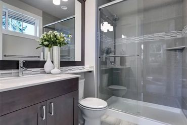 Modern bathroom with double vanity.