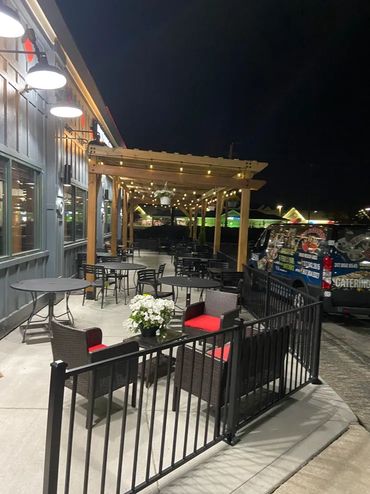 Night view of outdoor patio.
