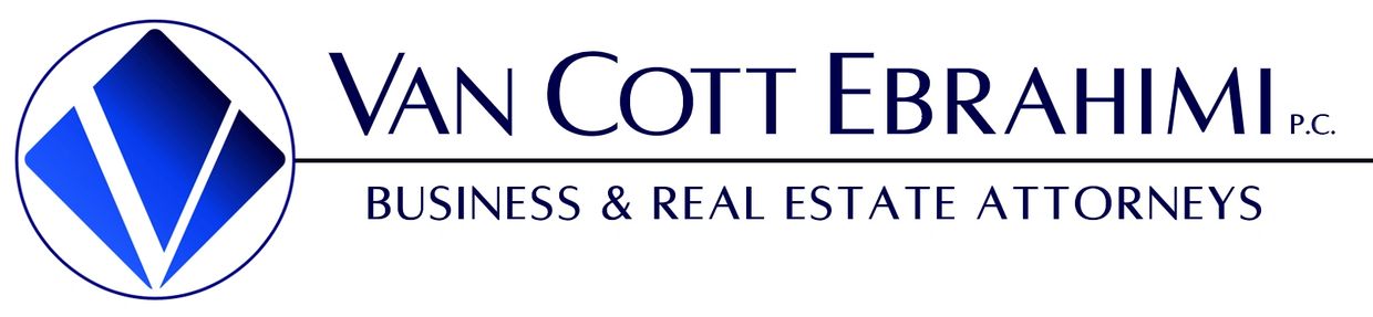 Circle with blue diamond logo for business and real estate law firm Van Cott Ebrahimi PC