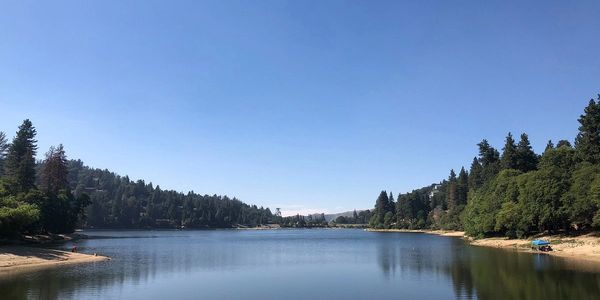Crestline,Ca mountain community surrounded by forest and waterfront views.

