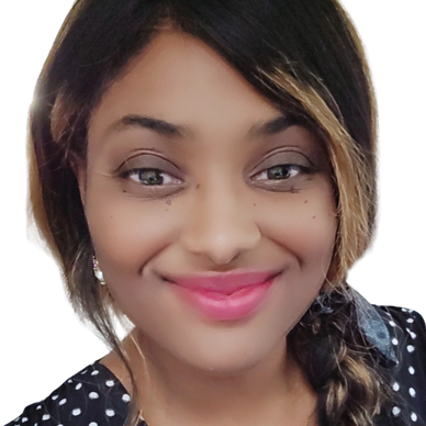 Smiling woman with braided hair in a black polka dot dress.