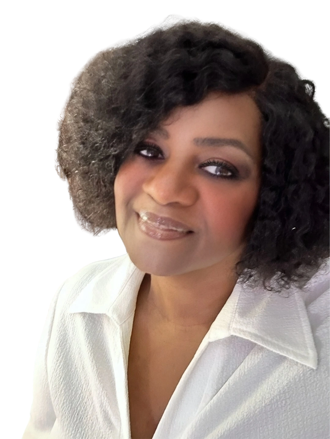Portrait of a smiling woman with curly hair wearing a white blouse.