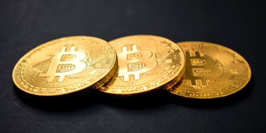 Bitcoin Novelty coins on grey background
