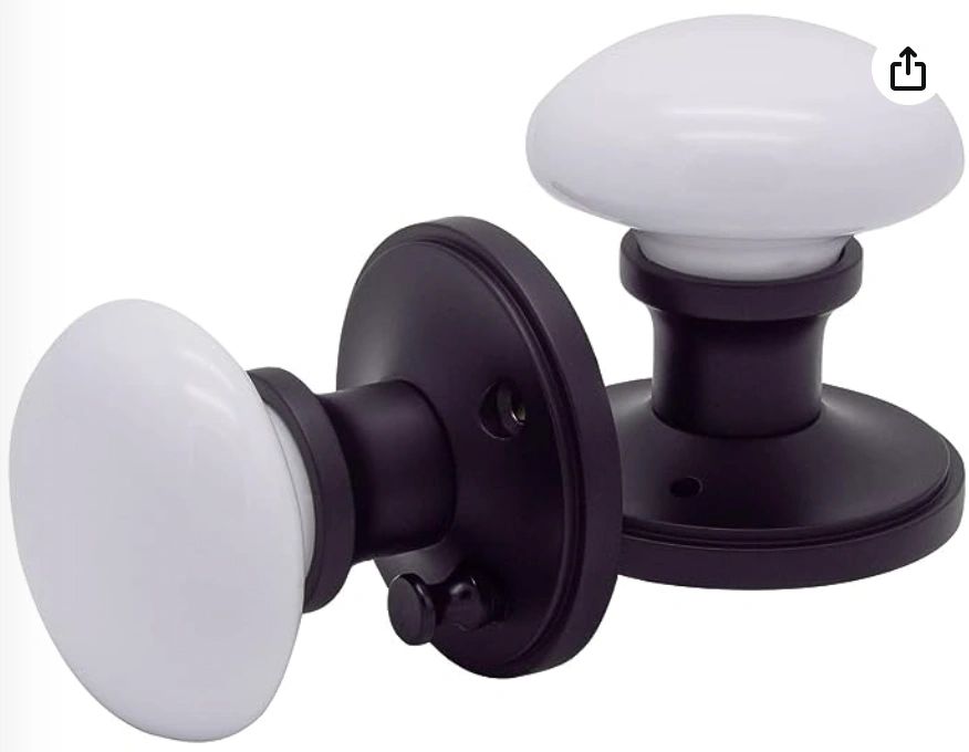 White and black interior door knobs.