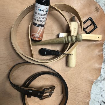Leather tools and material used to make a custom leather belt