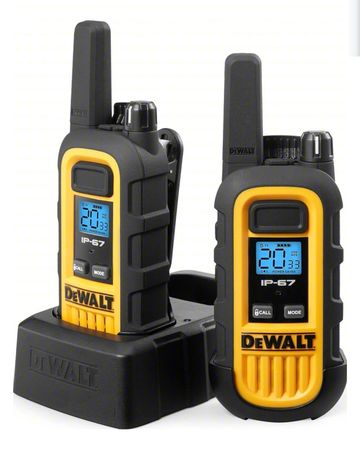 Two DeWalt walkie-talkies on a charging station.