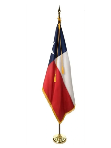 Texas state flag on a gold stand.