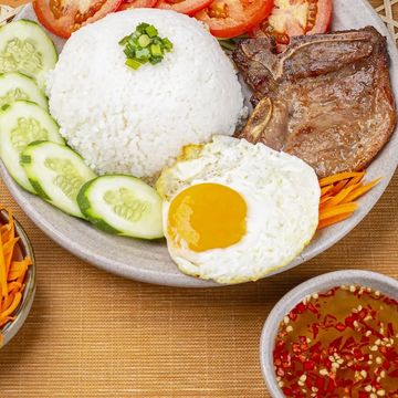 Grilled pork chop and fried egg