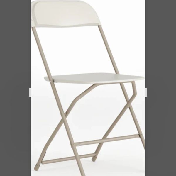 Simple beige folding chair with metal frame and plastic seat.