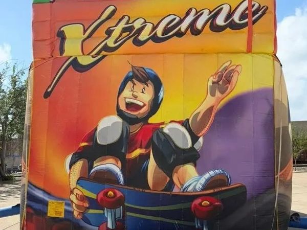 Colorful mural of a joyful skateboarder with 'Xtreme' text above.