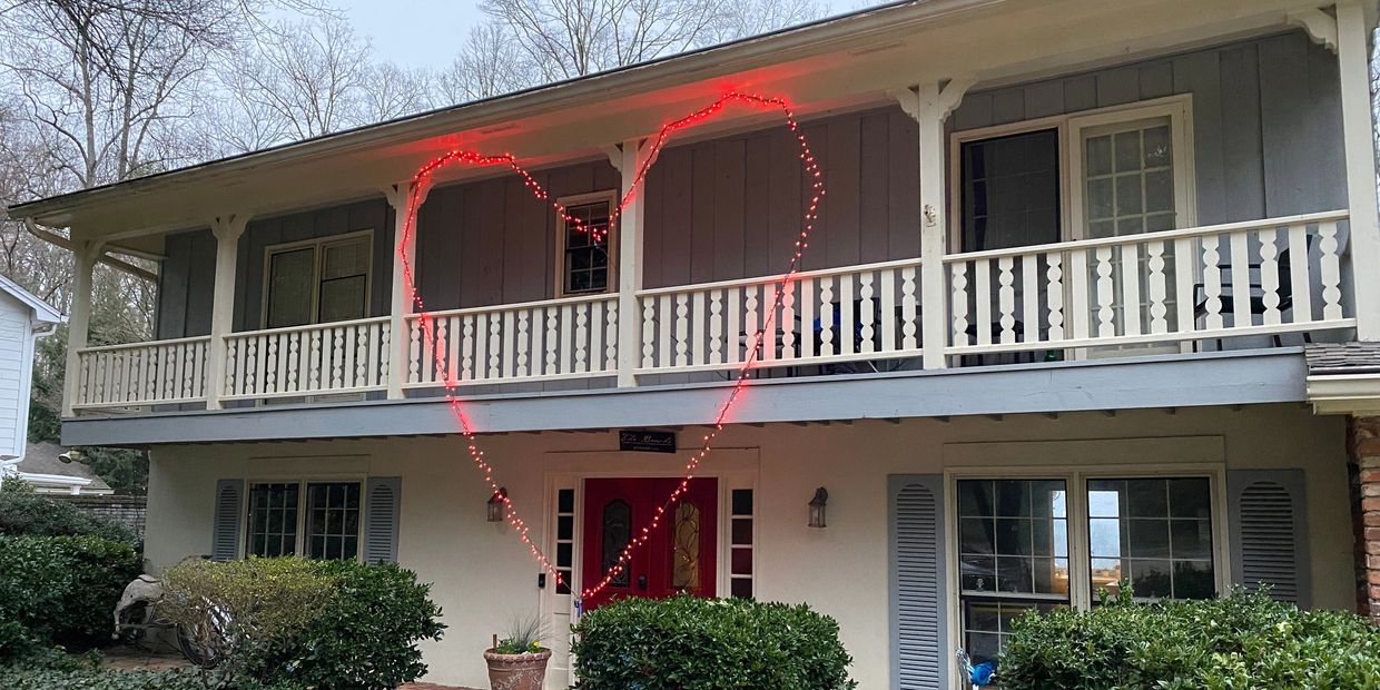 Beautiful two-story red heart for Valentine's Day. Made using red Christmas Lights in Atlanta, Sandy