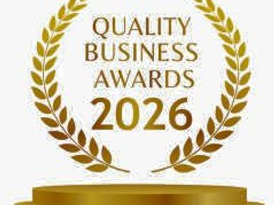 This is a golden emblem for the Quality Business Awards 2026.