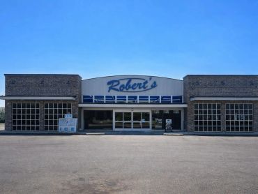 Exterior of Robert's store under clear blue sky.