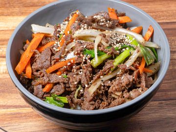 Beef with rice and vegetables.