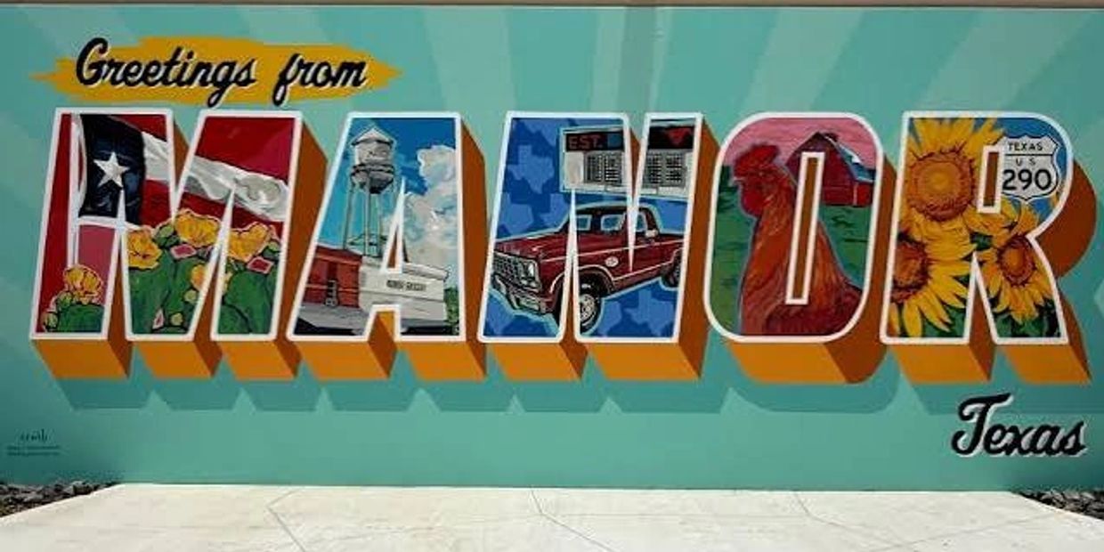 Colorful 'Greetings from Manor Texas' mural with local imagery.
