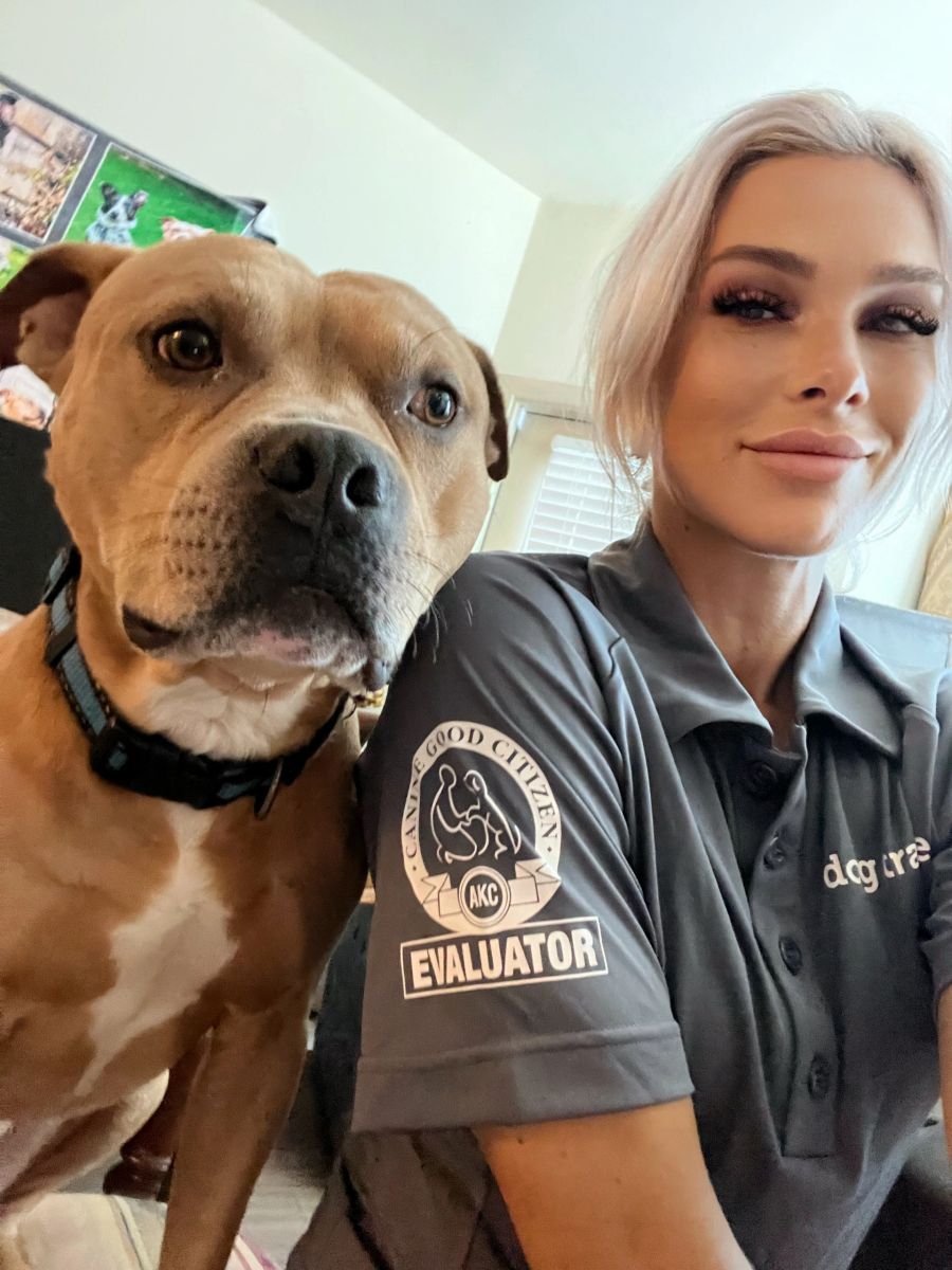Tiffany with a happy client dog