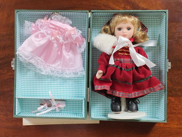Atlas Editions collectible heirloom hand painted porcelain doll. Presented in period carrying case.