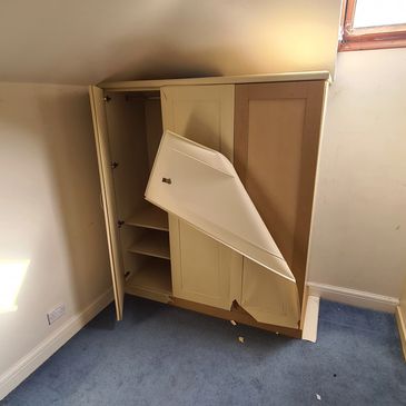 Broken wardrobe needing clearing in Framlingham