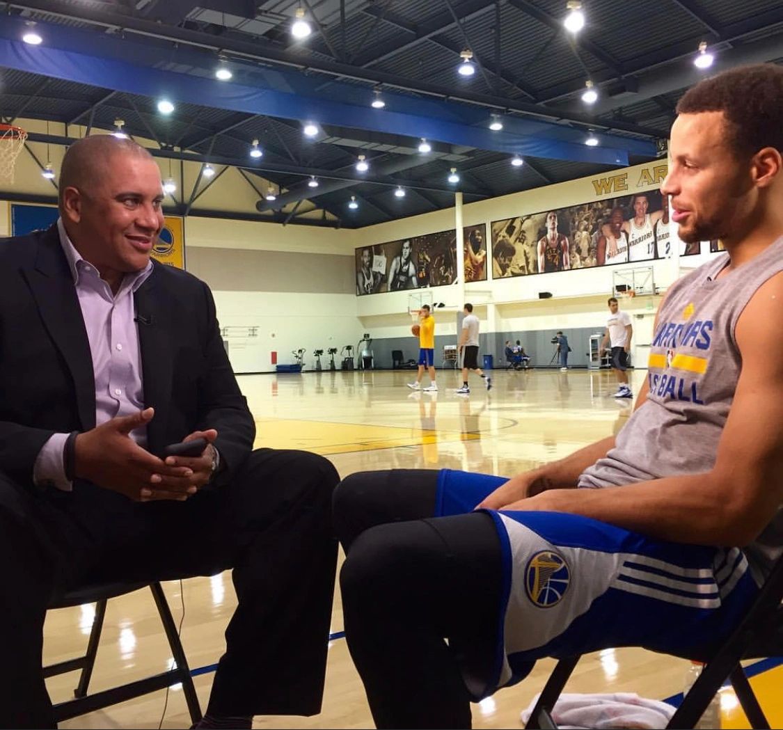 Marc Spears sitting down interviewing Stephen Curry; Credit Yahoo