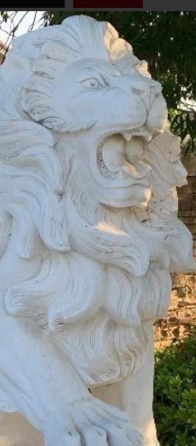 Huge carved stone lion sold!