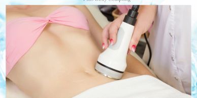 Woman receiving abdominal body sculpting treatment.