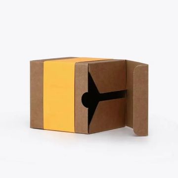 A brown cardboard box with a yellow band and unique star-shaped opening.