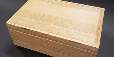 Polished wooden box with a smooth finish.