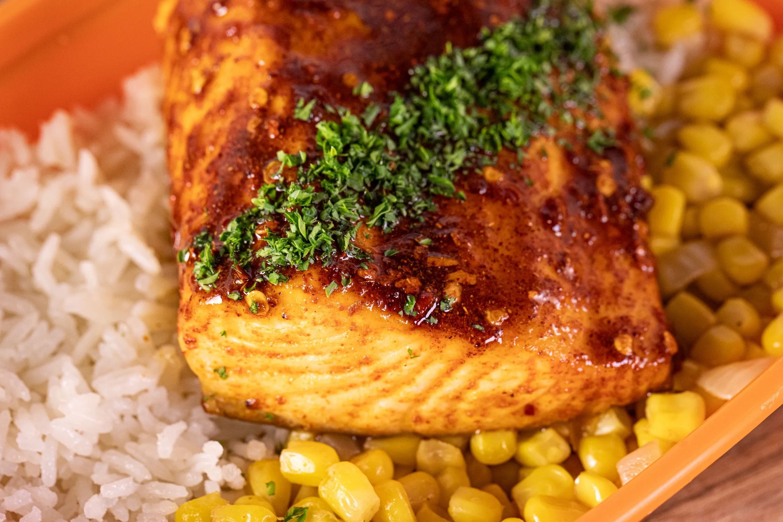 Local Honey & Harissa Glazed Faroe Island Salmon.
