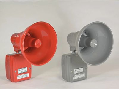 Two industrial alarms, one red and one gray.
