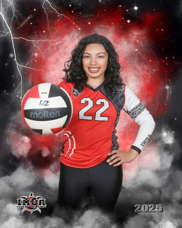 Volleyball player in red jersey holding a ball against a stormy background.