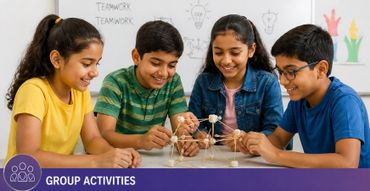 Four students collaborating on a hands-on group project using toothpicks and marshmallows.