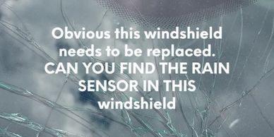 A windshield that definitely needs replacing.  This specific windshield has a rain sensor.  Most sen