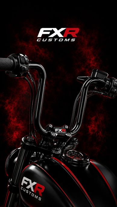 Close-up of a black motorcycle handlebar with FXR branding.