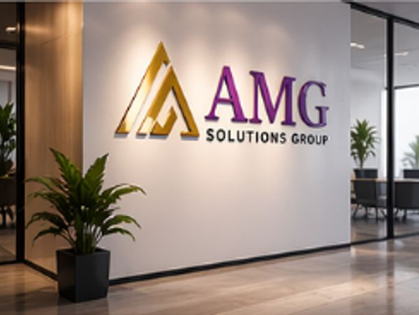 Modern office wall with AMG Solutions Group logo and plants.