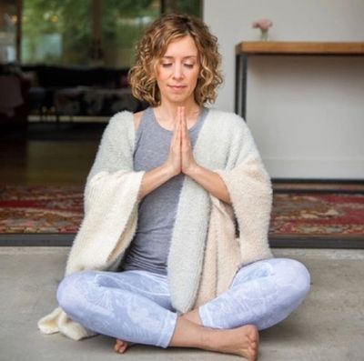 Amy gave a testimony. This is her in prayer pose. She is a beautiful yoga instructor. 