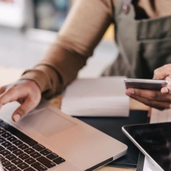 Small business owner receiving digital marketing support from Kim Gately Digital in Woburn, MA