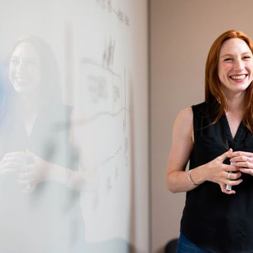 A happy woman answering questions