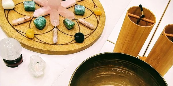 Sound healing session as part of a women’s wellness event facilitated by  Aligned Soul Collective.