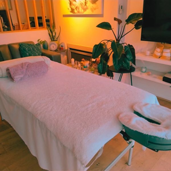 Serene Reiki healing room in Adelaide with comfortable treatment table for energy healing sessions.