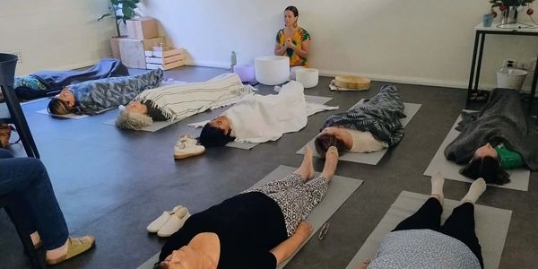 Reiki Share in Adelaide featuring guided meditation and crystal bowl sound healing.