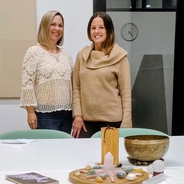 Two Reiki trainers facilitating Reiki training in Adelaide for beginners learning energy healing