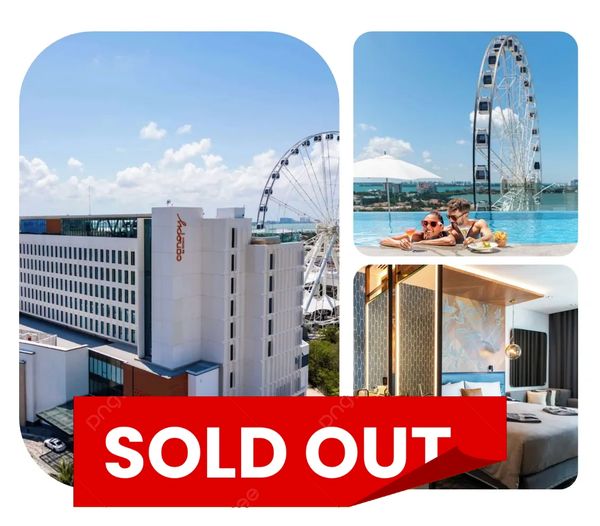 Modern hotel with rooftop pool and Ferris wheel view.