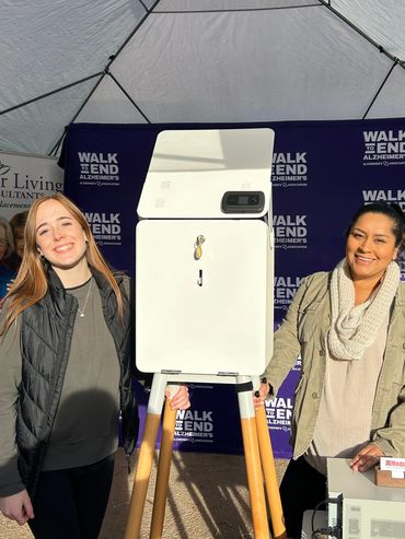 printing photo booth service attendants posing and smiling at San Luis Obispo event