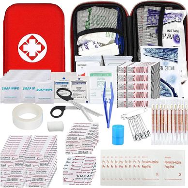 Open first aid kit with medical supplies.