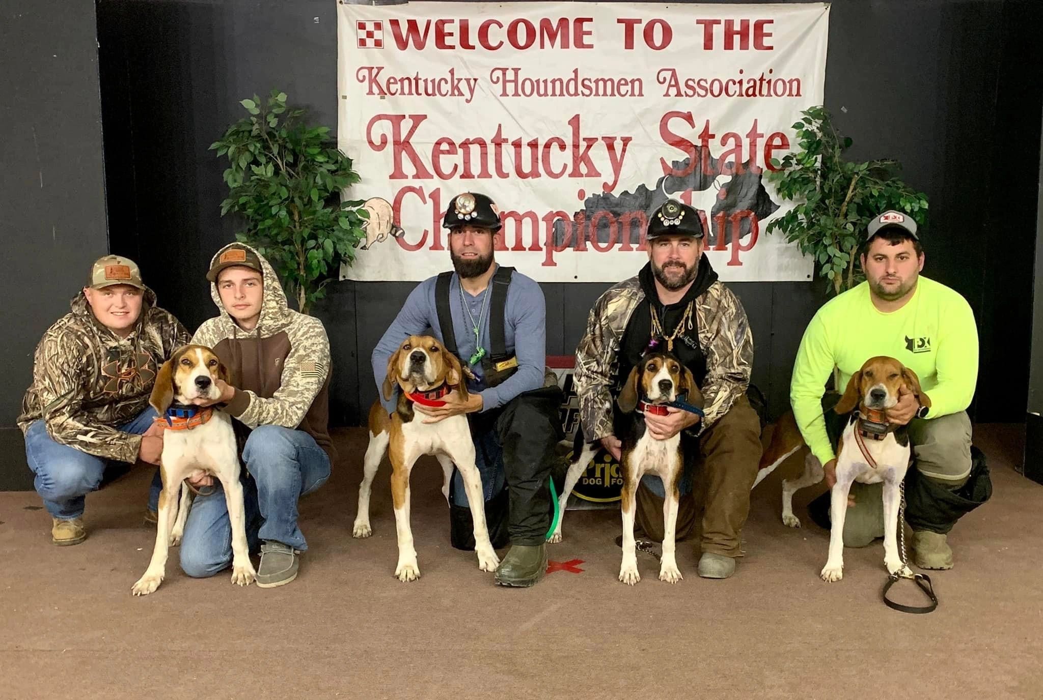 Four men with their hound dogs at Kentucky State Championship event.