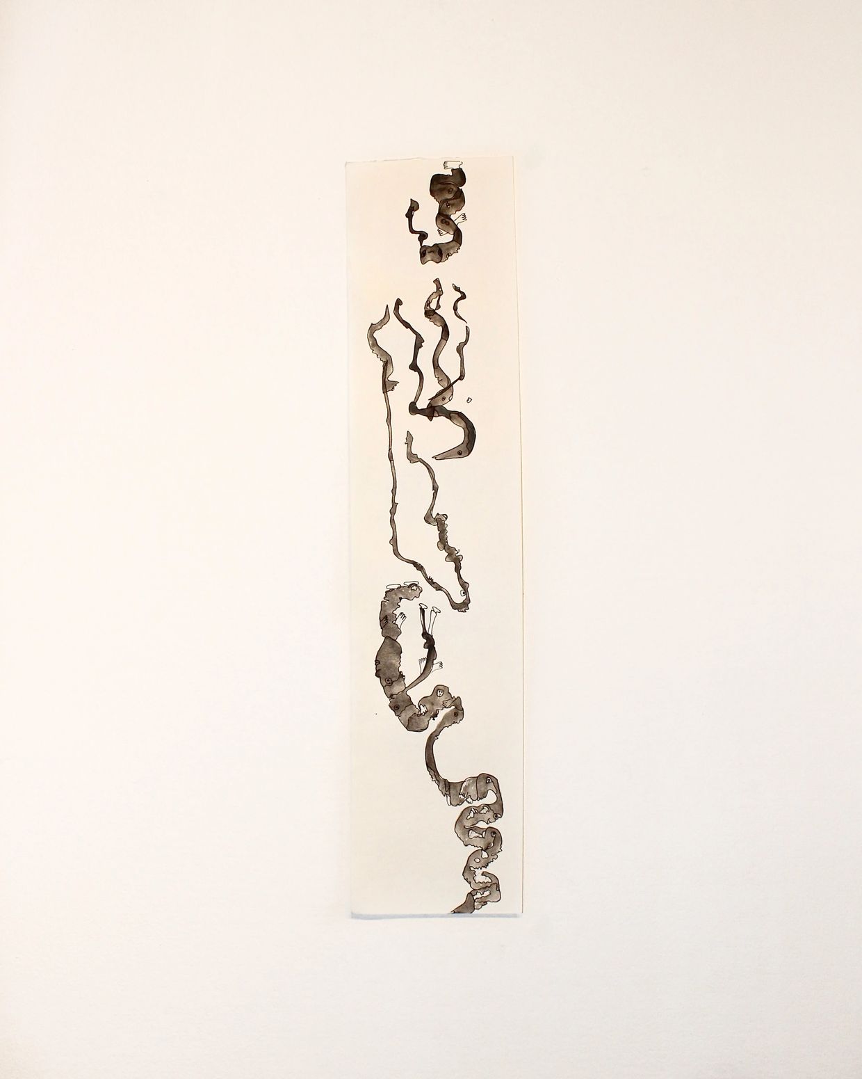 Abstract ink drawing on a tall, narrow white paper with wavy black lines.