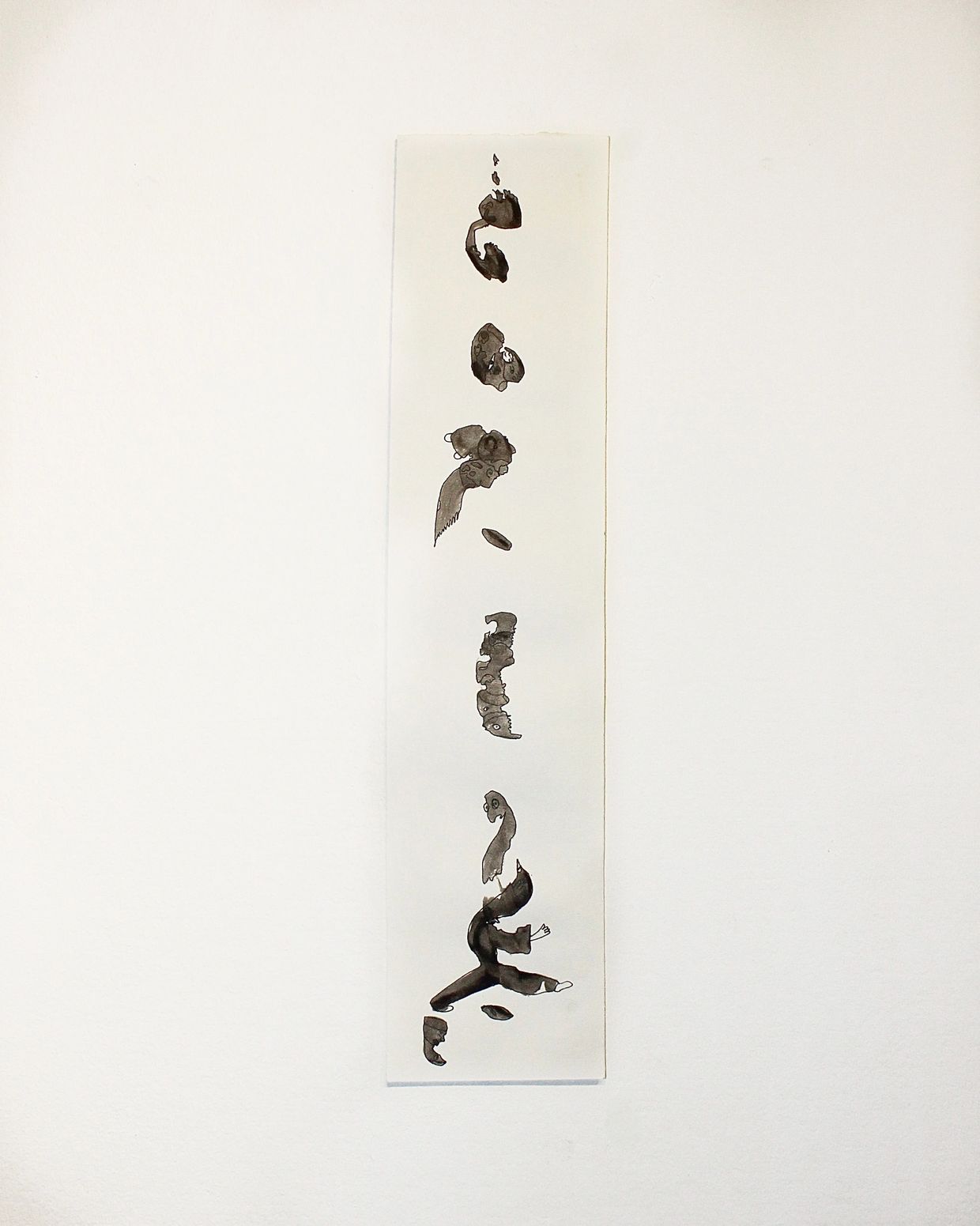 Vertical abstract ink painting on paper with organic shapes and textures.