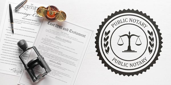 Notary Public signing a last will and testament.