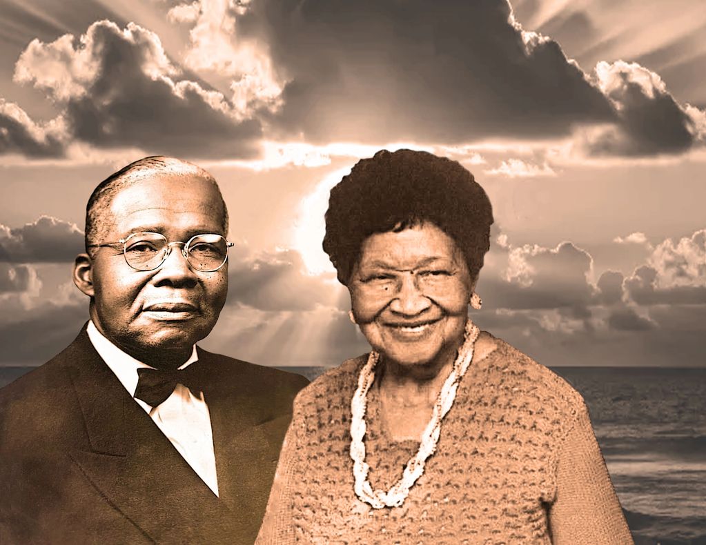 Portrait of an elderly couple with a dramatic sunset sky background.
