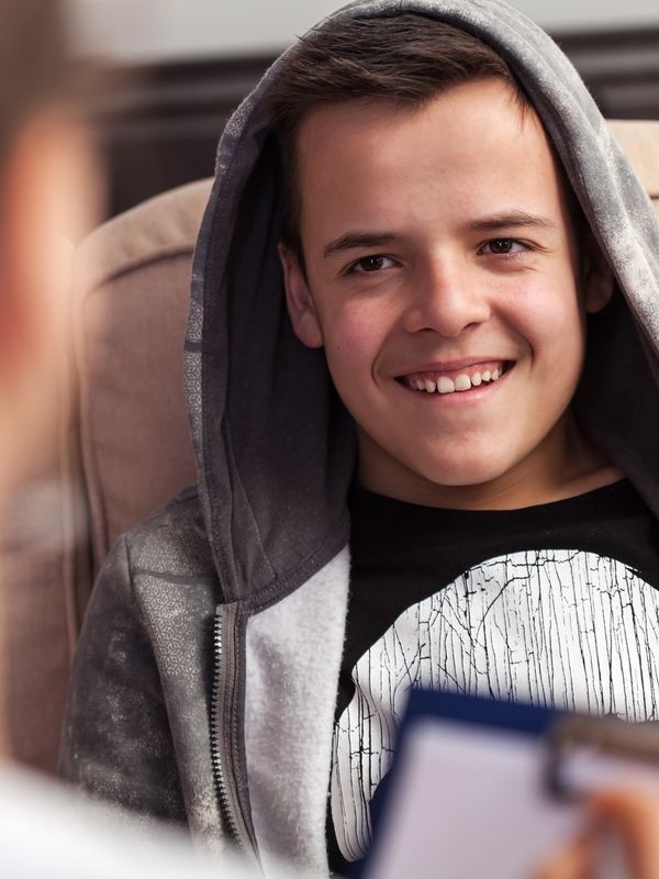 Young boy in a counseling session at the psychologist